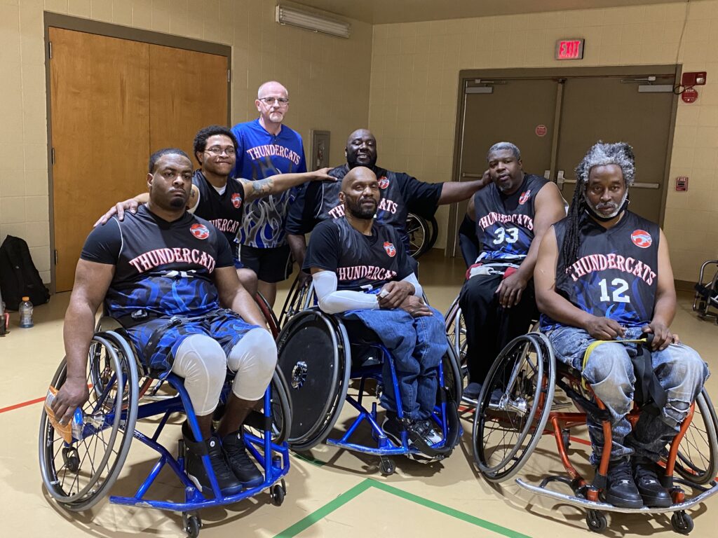 A team of wheelchair basketball players